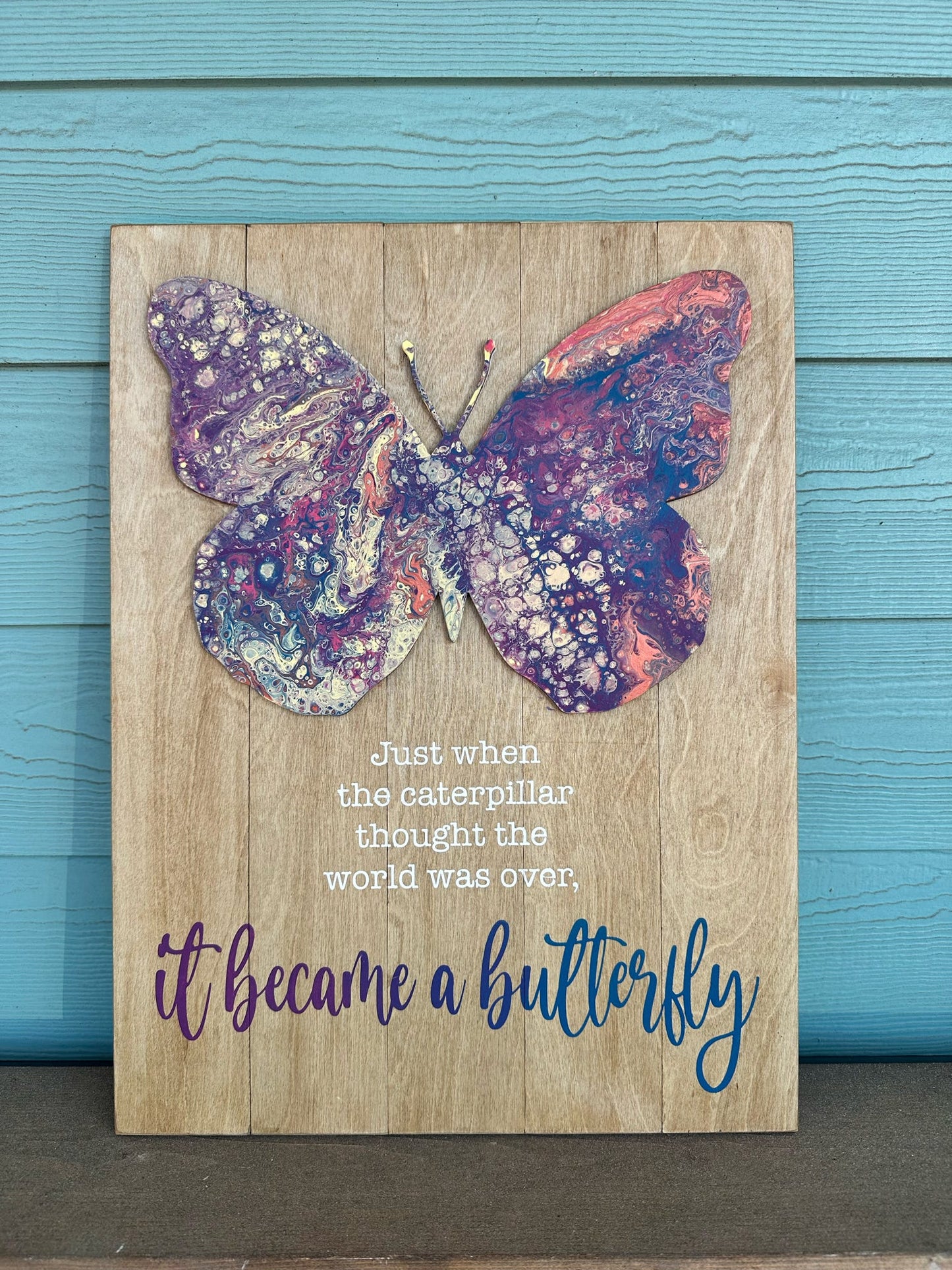 It became a butterfly A5850 Paint pour and mixed media