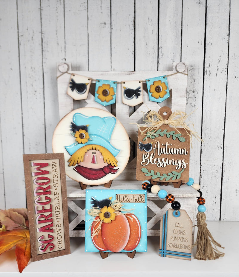 Scarecrow and fall themed wooden tier tray collection ready to paint