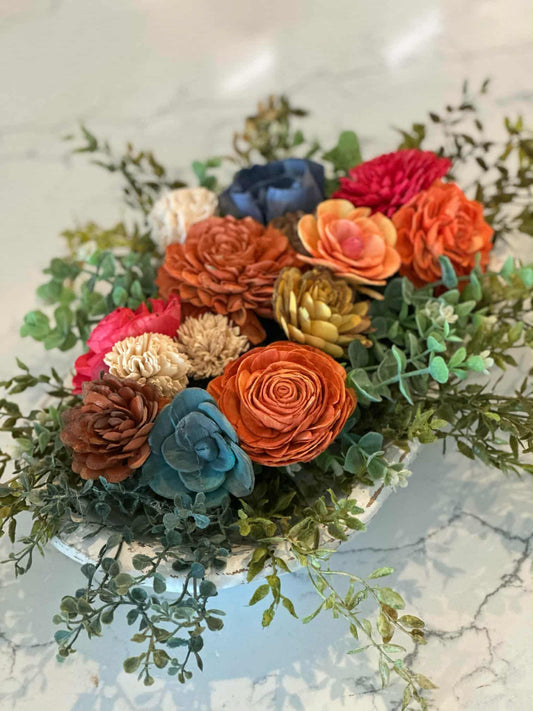 Colorful flower arrangement on a marble surface