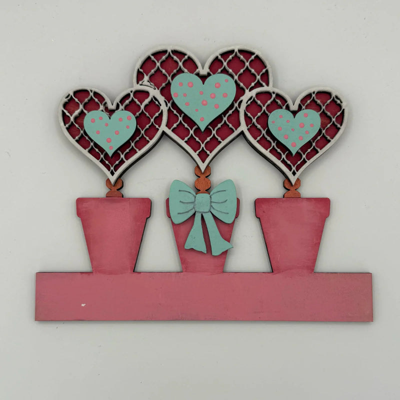 Heart topiary trio wooden dropin set on a white background
