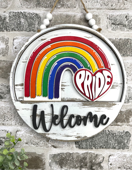 Pride Rainbow interchangeable wooden Welcome sign insert featuring a colorful layered rainbow and red heart with retro PRIDE lettering.