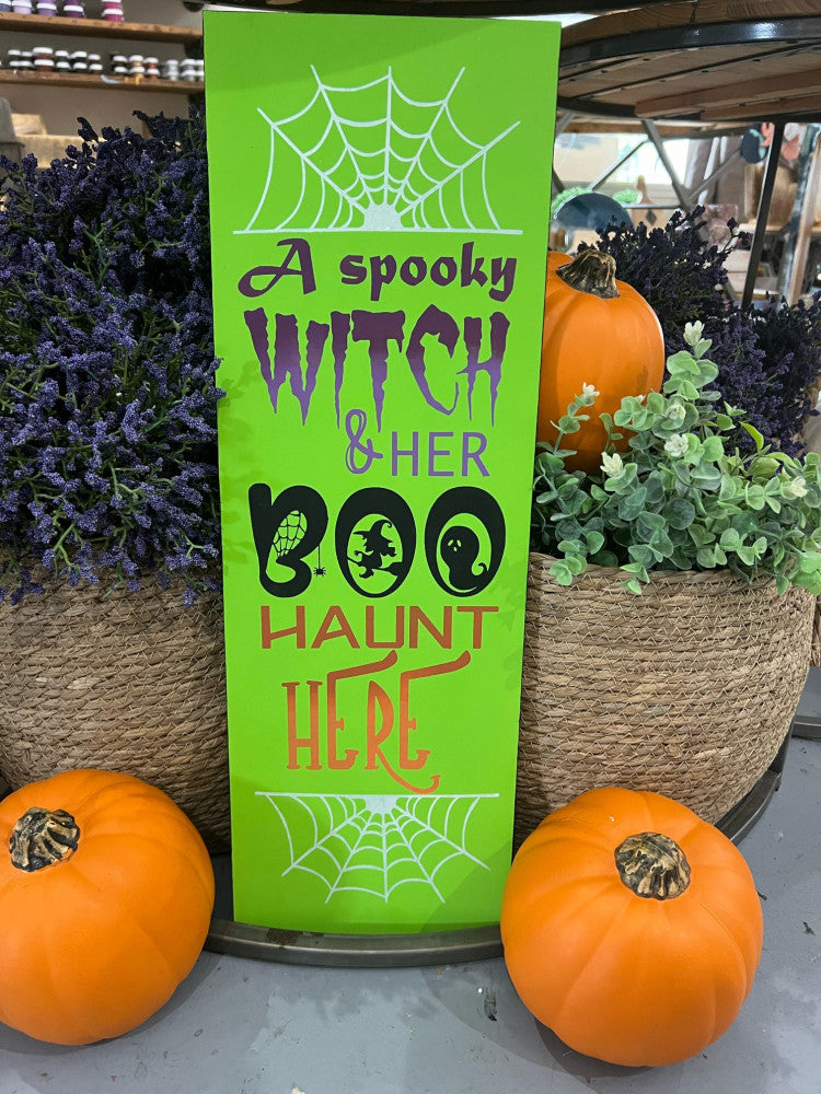 A spooky witch and her boo haunt here A5967 3D Plank porch leaner