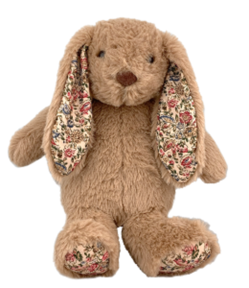 Plush bunny toy with floral ears on a white background