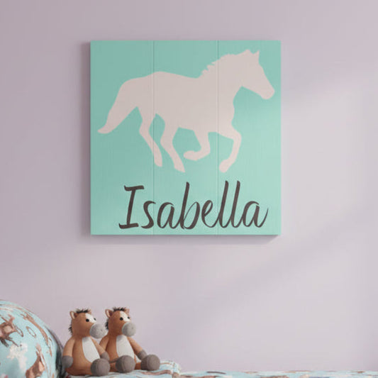 Silhouette of a horse on a soft green backgroud with the name Isabella under. Available to personalize