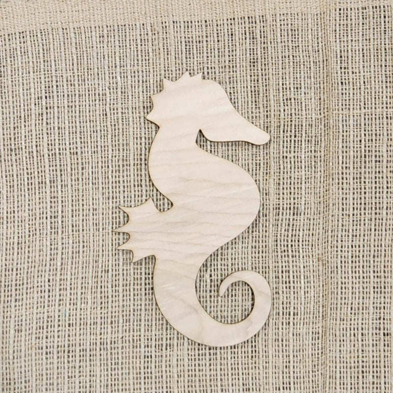 A wooden cutout in the shape of an seahorse