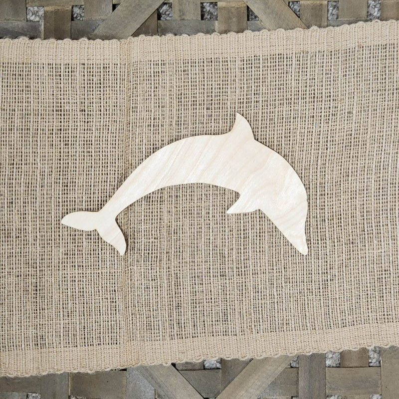 A wooden cutout in the shape of a butterfly 